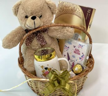 Enchanting Daughter’s Day gift hamper filled with Teddy, chocolates, and more