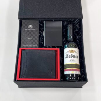 Good bosses day gifts hamper filled with perfume, wallet, and more