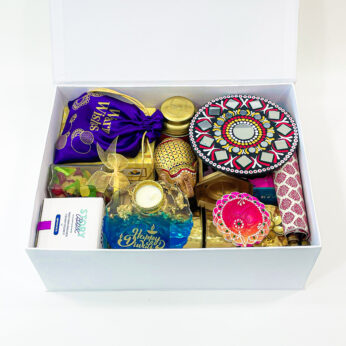 Celebrate Diwali with a Burst of Color and Joy with Our Colorful Gift Hamper – Sweets, Chocolates, Lamps, Diyas, and More