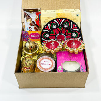 Perfect Dhanteras Gift with blend of nuts, chocolates, candles, and more in a delightful gift box