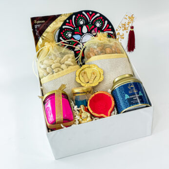 Dhanteras Delights Gift Boxes with Ferrero Rocher, Rangoli Wall Hangings, Ganapathy Statues, and More