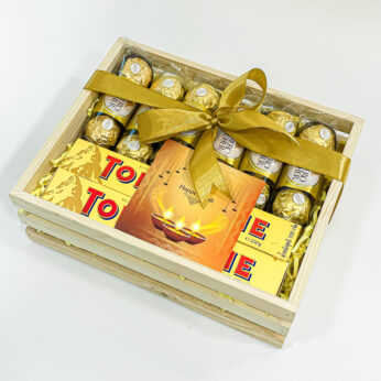 Celebrate Diwali with Sweet Delights: Diwali Chocolate Box Gift Hampers with Toblerone of Switzerland Milk Chocolate, Ferrero Rocher And Diwali Greeting Card