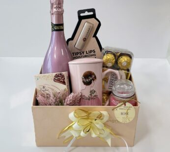 Heartwarming Lohri gift for her filled with a customized mug, Lip balm, and chocolates