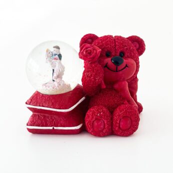 Beautiful solid teddy bear and couple snow globe