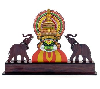 Cultural legacy engraved in a Kathakali and elephant memento (9.84 x 14.1 x 2.16 inc)