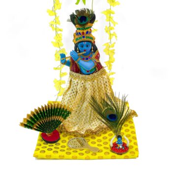 Elegant Valkannadi Mirror (H-4.5in, L-2.8in),Small Krishna Figurine (H-1.5in, L-2.2in), Thiru Udayada Statue (H-5in, L-8.5in) and Kanikonna flower