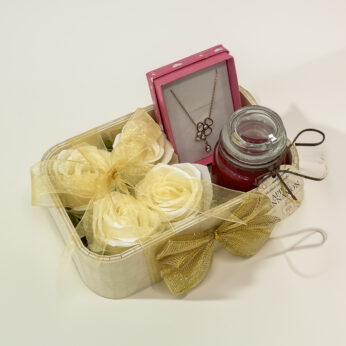 Bridesmaid Appreciation: A gifts hamper with candle and flowers