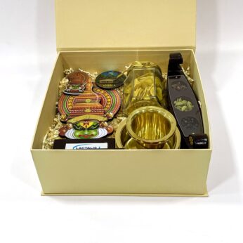 Traditional Handcrafted Gifts from Kerala filled with Kathakali stand, Brass Dabara, and more